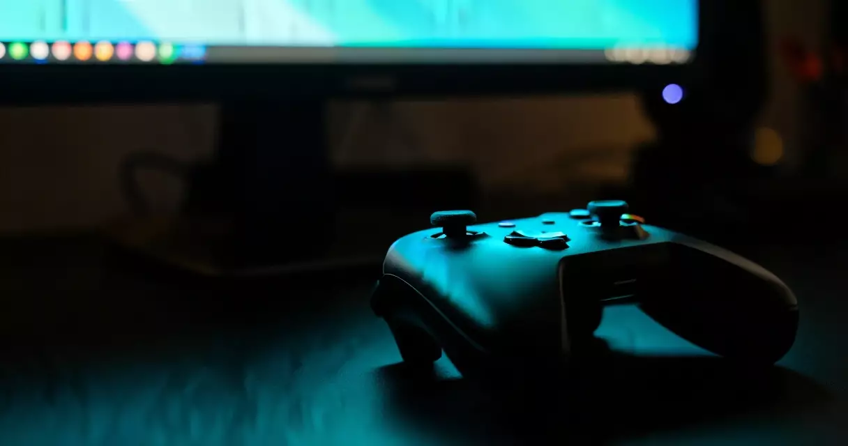 Gaming controller on desk with moody ambient light