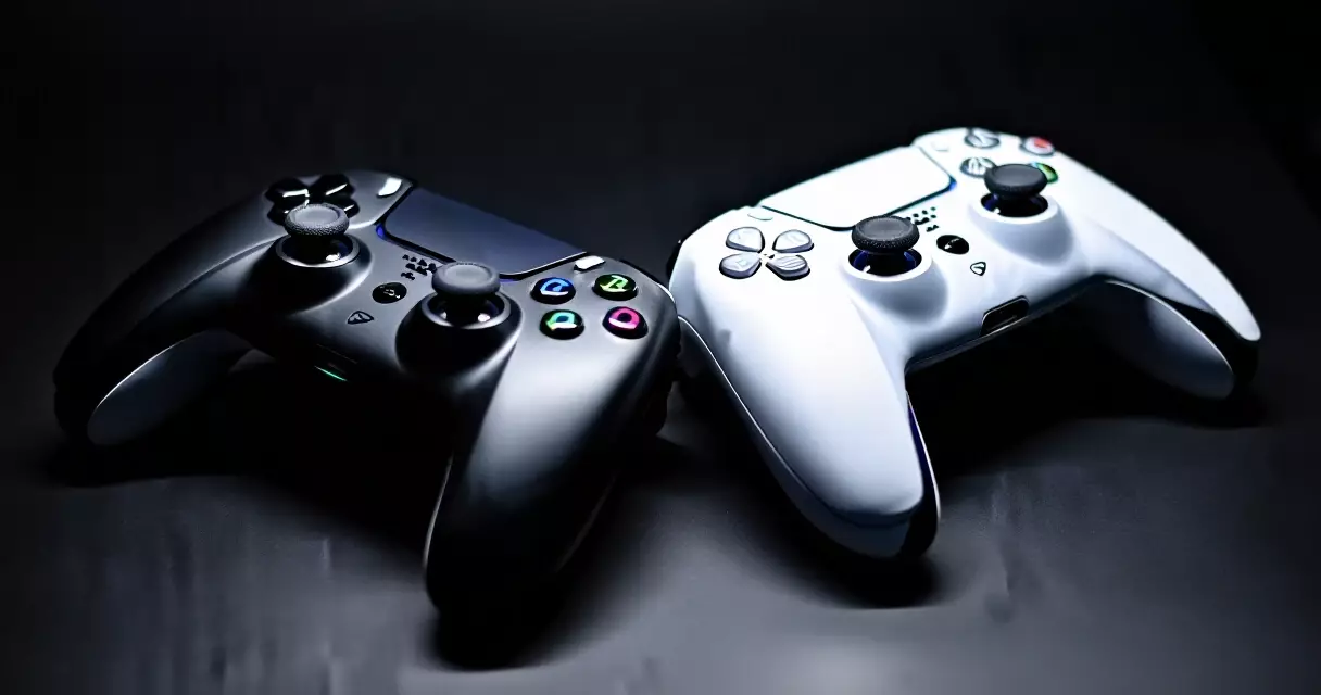 Two limited-edition DualSense controllers on a gaming desk, one black and one white