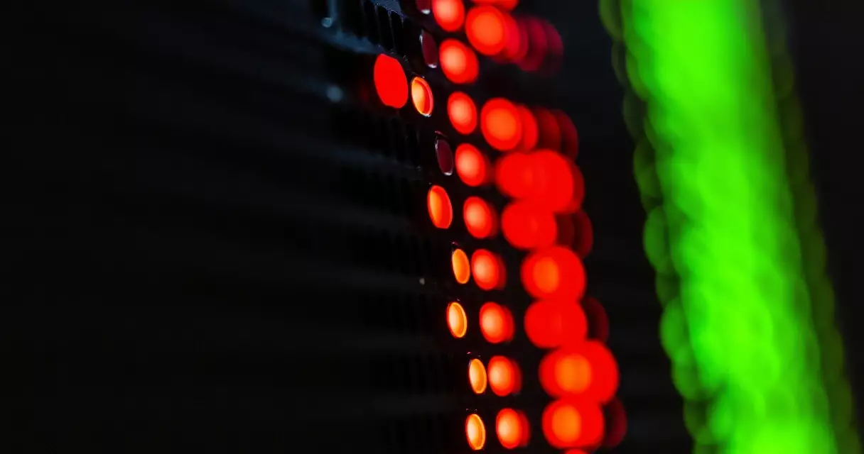 Macro view of a QD-OLED panel showing saturated colors and pure black background