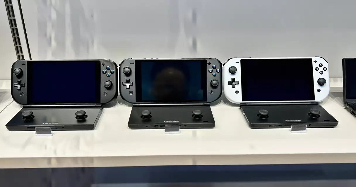PC gaming handhelds displayed side by side on a retail shelf for comparison