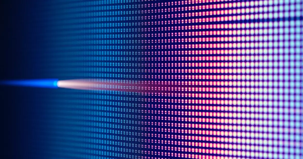 Macro view of monitor pixels showing ghosting trail behind a moving object