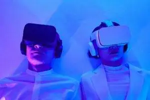 Two people immersed in VR, highlighting future technology and virtual engagement.